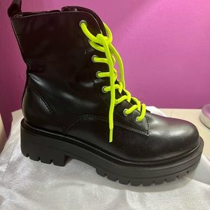 Get in on the combat trend with the Women's Madden Girl Kurrt Ankle Boot.